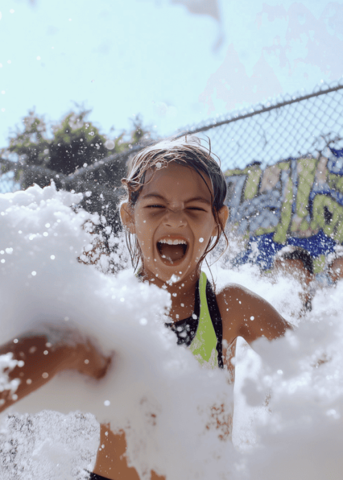 envisionskylimit_Three_Hispanic_kids_aged_6-9_playing_with_mini_fc63110f-5cc5-4618-92f8-0ebd3ebeb2ea